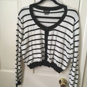Cute 50s inspired sweater... She’s longing!